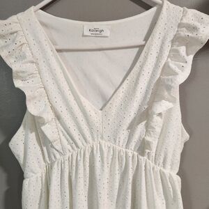 Kaileigh brand white dress. No size tag, but fits like a med. Made in Mexico